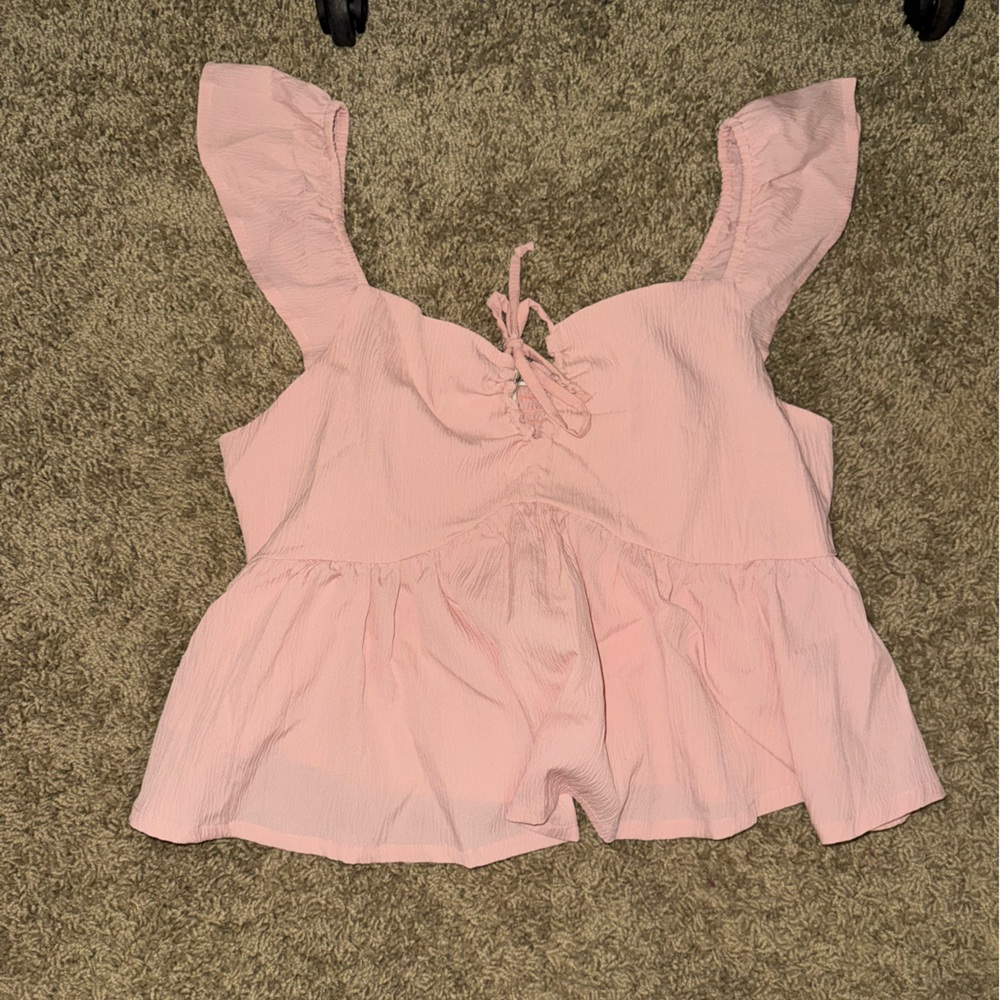 Pink Sleeveless Peplum Top
